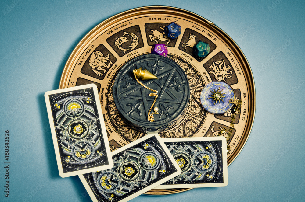 zodiac signs magic pendulum, astrology dice, tarots like esoteric concept zodiac signs magic pendulum, astrology dice, tarots like esoteric concept