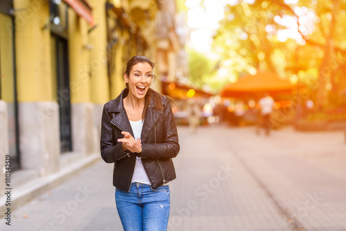 A happy young woman enjoying the autumn in a Central European ci © Spectral-Design
