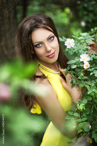 Wonderful girl in yellow dress  closeup. Creative portrait of girl 