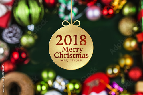 Christmas background with decorations and gift boxes on wooden board © dashu83