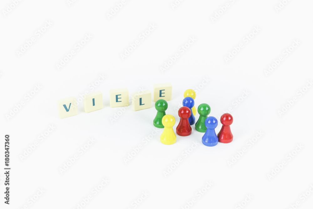 Eine Bunte Mischung: Spielfiguren stehen neben dem Wort: Viele! Eine Bunte Mischung: Spielfiguren stehen neben dem Wort: Viele!