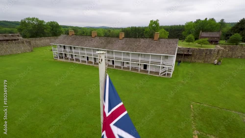 Aerial of the Calvert Arms/King’s Colors flag waving in the breeze with ...