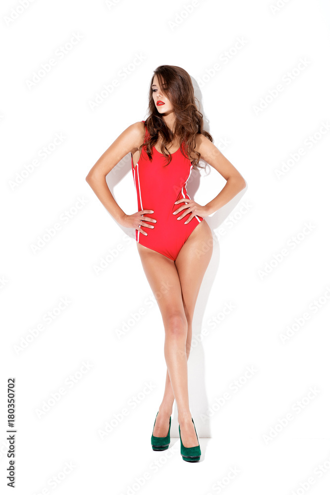brunette woman in a red swimsuit brunette woman in a red swimsuit