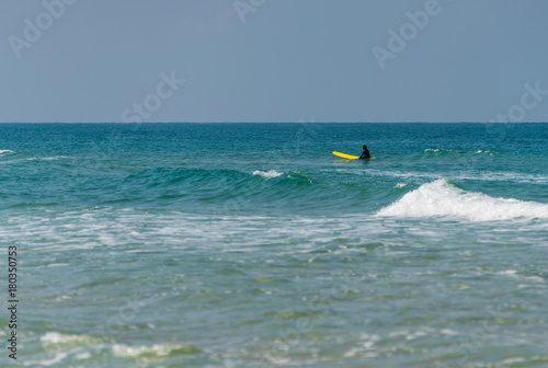 man on a surf in the sea