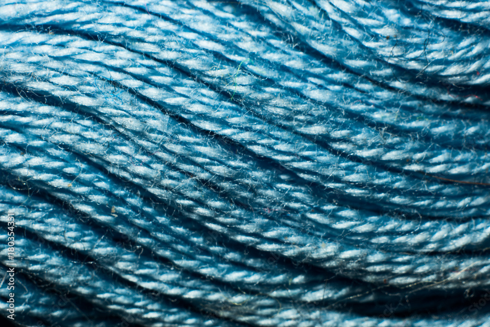 Texture of blue yarn macro Texture of blue yarn macro