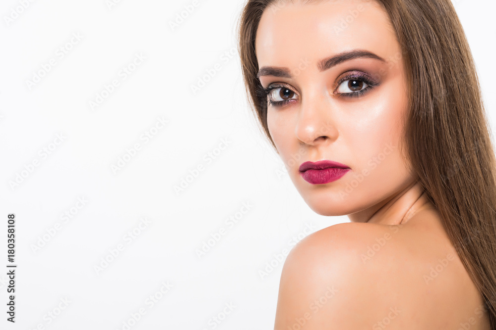 Obraz premium Beauty Woman Portrait. Professional Makeup for Brunette with Blue eyes - Red Lipstick, Smoky Eyes. Beautiful Fashion Model Girl. Perfect Skin. Make up. Isolated on a White Background.