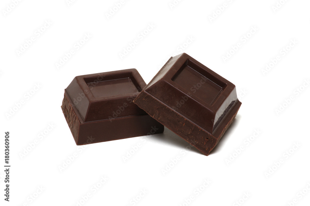 Fototapeta premium Chocolate pieces on a white