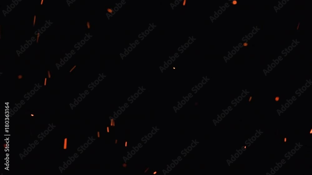 ultra slow motion high speed shot of fire flames and glowing ashes on black background ultra slow motion high speed shot of fire flames and glowing ashes on black background