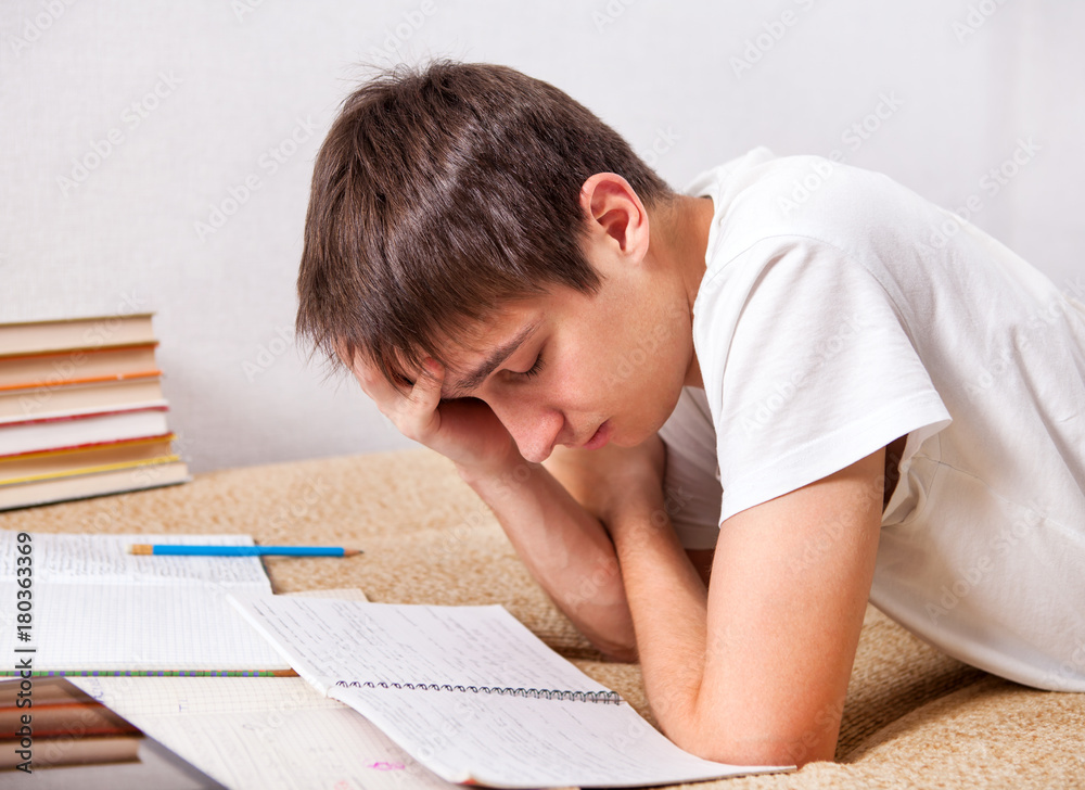 Tired Student working at Home Tired Student working at Home