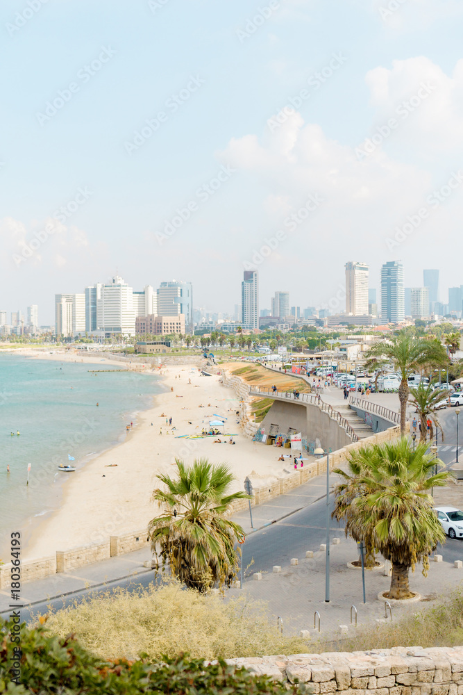 Viev on the beach and urban city Tel-Aviv. Summer coastline Viev on the beach and urban city Tel-Aviv. Summer coastline
