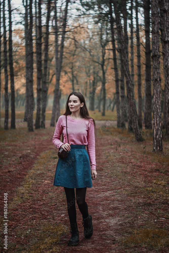 girl blogger with a camera in the autumn red forest, warm toning girl blogger with a camera in the autumn red forest, warm toning