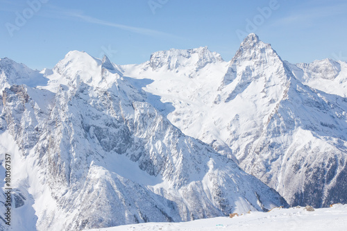 Winter mountains with high peaks.