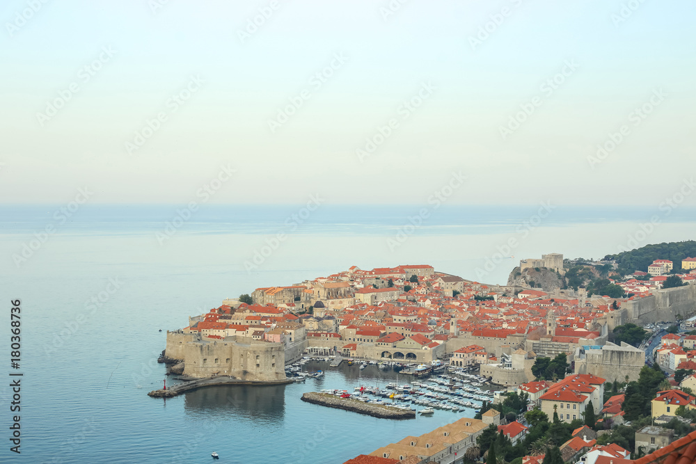 A view of the old town of Dubrovnik with the sea port in Croatia.  