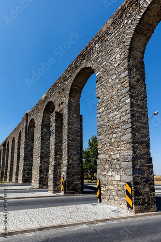 Evora aqueduct, one of the Iberian Peninsula's greatest 16th century building projects, provided clean drinking water to Evora by connecting the city to the nearest constant flowing river, 9km away. photo