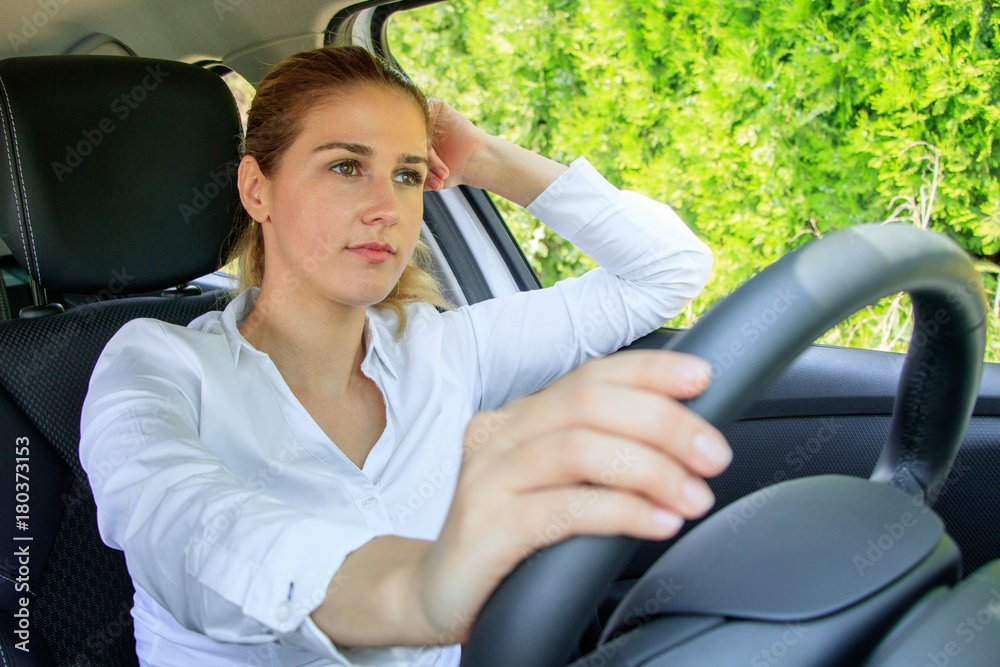 Woman is driving her car Woman is driving her car