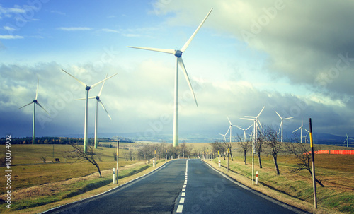 Wind turbine and road. © noskaphoto