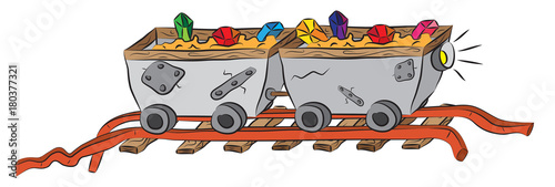 Mining carts on railway loaded by precious crystals ore