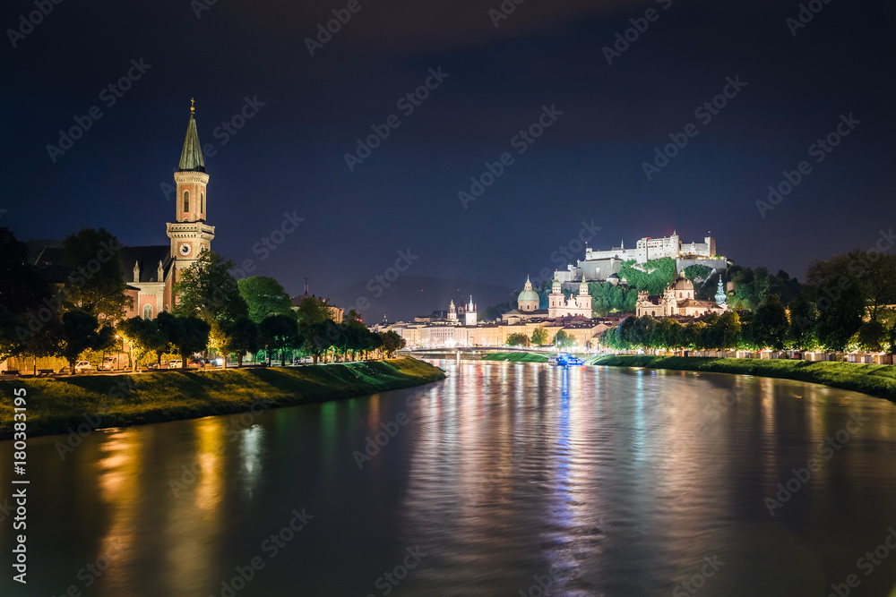 Fototapeta premium Great view on an evening city shining in the lights. Picturesque scene. Location famous place (unesco heritage) Festung Hohensalzburg, Salzburger Land, Austria, Europe. Beauty world
