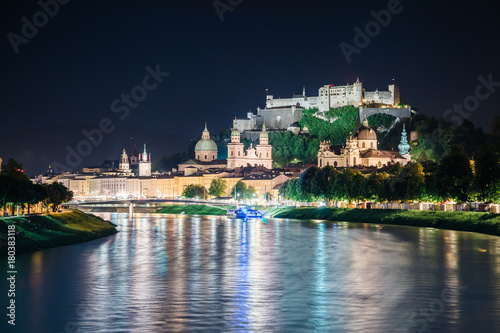 Great view on an evening city shining in the lights. Picturesque scene. Location famous place (unesco heritage) Festung Hohensalzburg, Salzburger Land, Austria, Europe. Beauty world