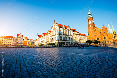 Fantastic view of the ancient homes on a sunny day. Location famous Market Square in Wroclaw, Poland, Europe. Historical capital of Silesia. Beauty world.