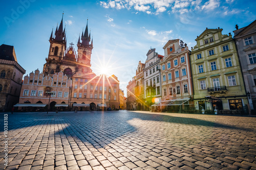 Fantastic view of the Temple of Our Lady before Tyn in sunlight at dawn. Location famous place (unesco heritage) Prague, Czech Republic, Europe. Beauty world.