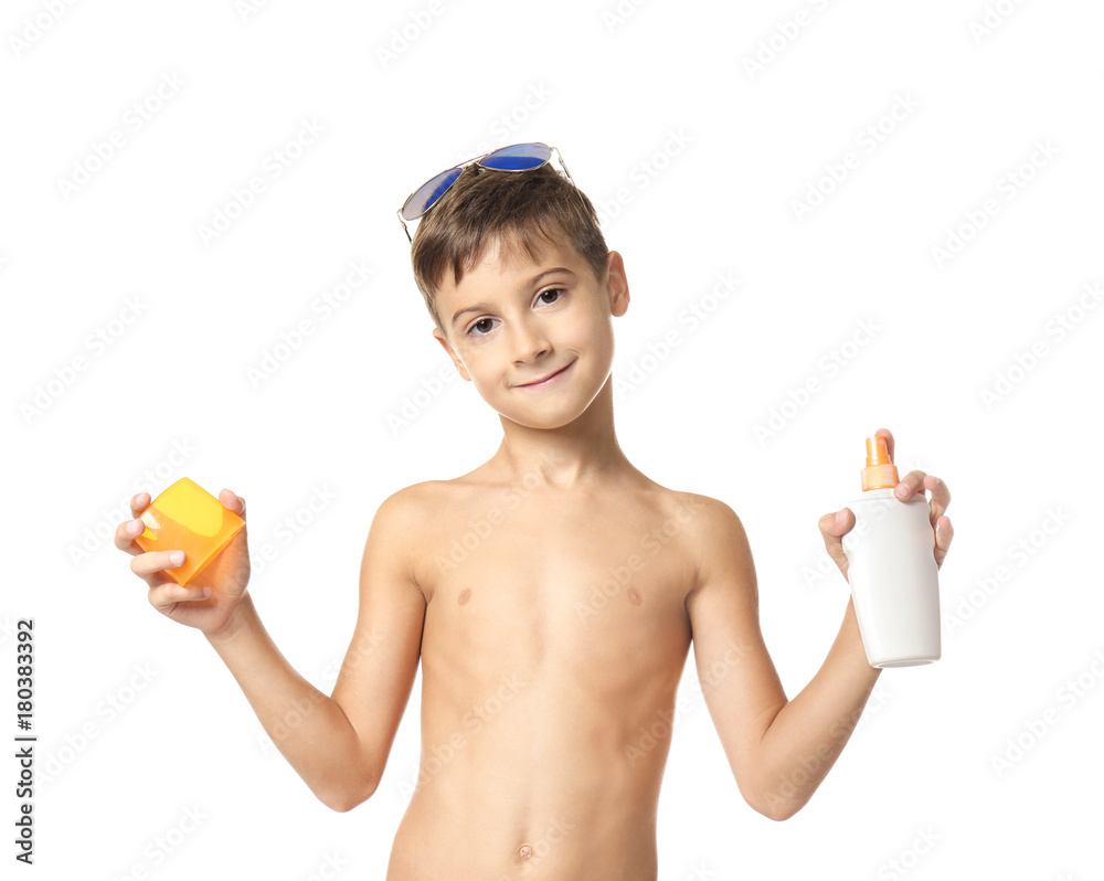Cute little boy with suntan cream on white background Cute little boy with suntan cream on white background