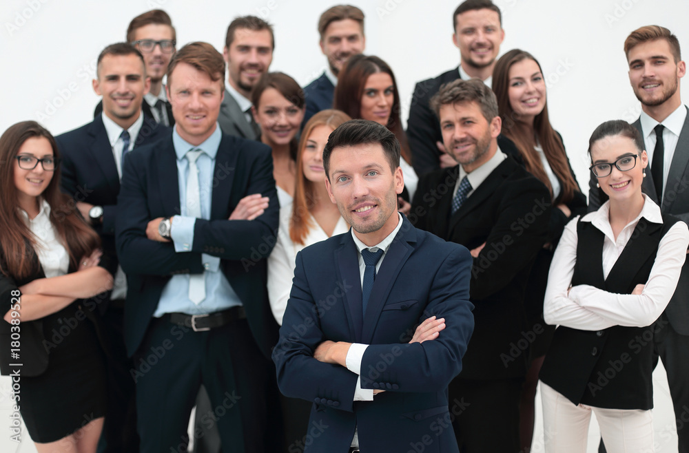 leader standing in front of a large business team