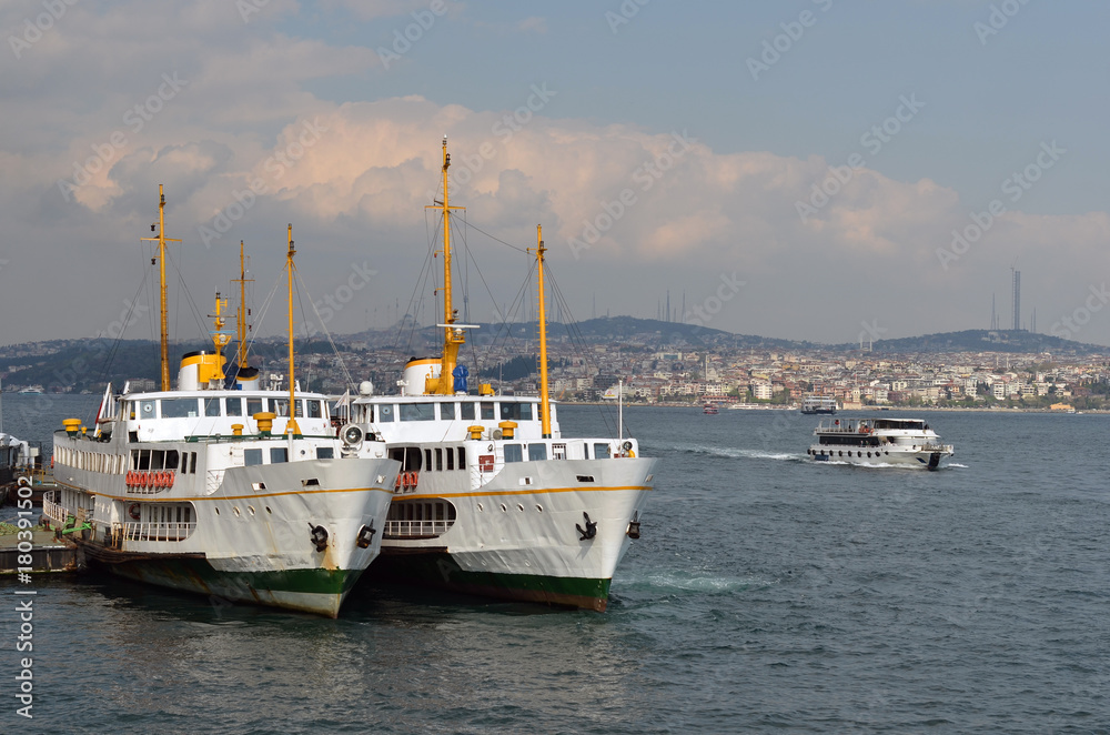 small passenger ships are moored small passenger ships are moored