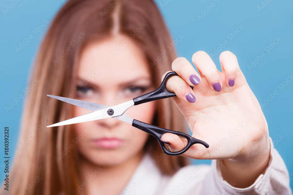 Young professional hairdresser with scissors. Young professional hairdresser with scissors.