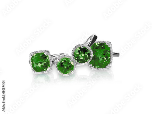 Set of green emerald rings gemstone fine jewelry. Group stack or cluster of multiple gemstone diamond rings.
