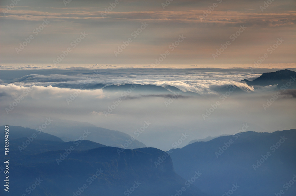 Bohinj range and valley of Sava Bohinjka between Pokljuka and Jelovica plateau with cliffs of Babji Zob under autumn mist and rolling sea of clouds, Julian Alps, Carniola / Gorenjska, Slovenia, Europe