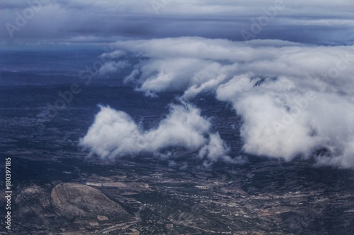 Clouds and landscape from an airplane