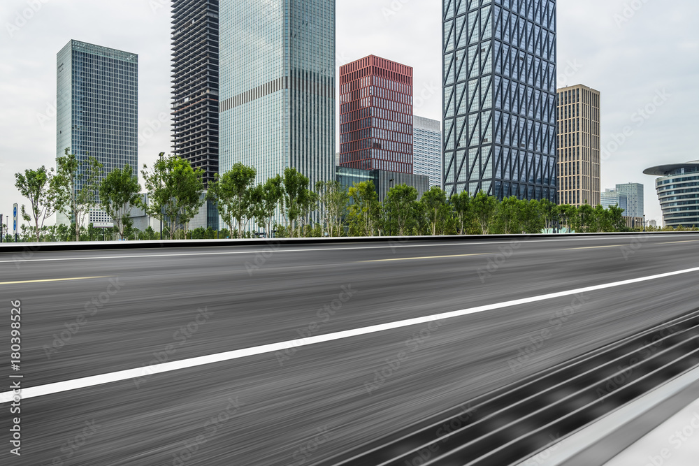 empty asphalt road with city skyline background in china..