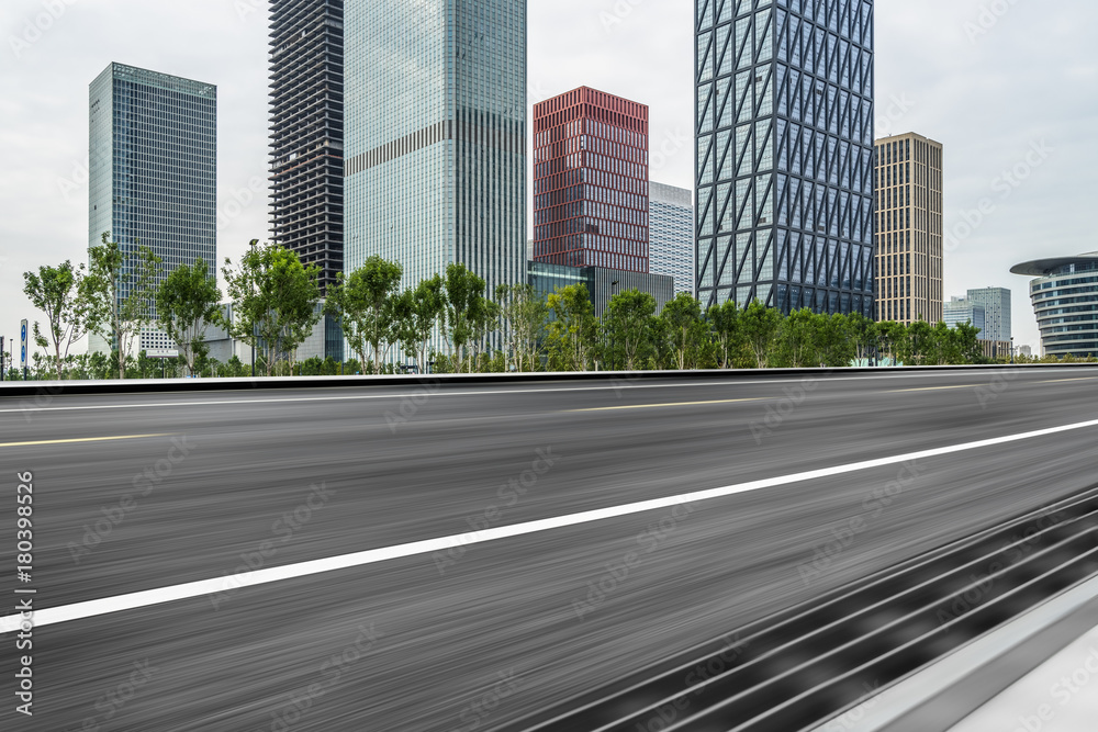 empty asphalt road with city skyline background in china.. empty asphalt road with city skyline background in china..