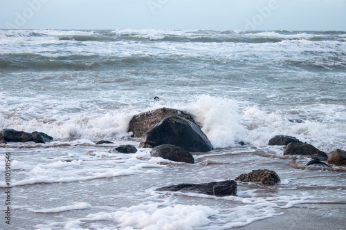 Waves on a beach in the town of Hirtshals in Denmark.