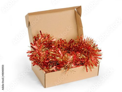 Box with christmas tinsel i...