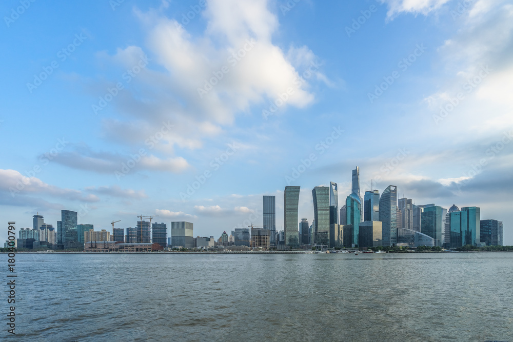 shanghai skyline undge blue sky with reflection, China