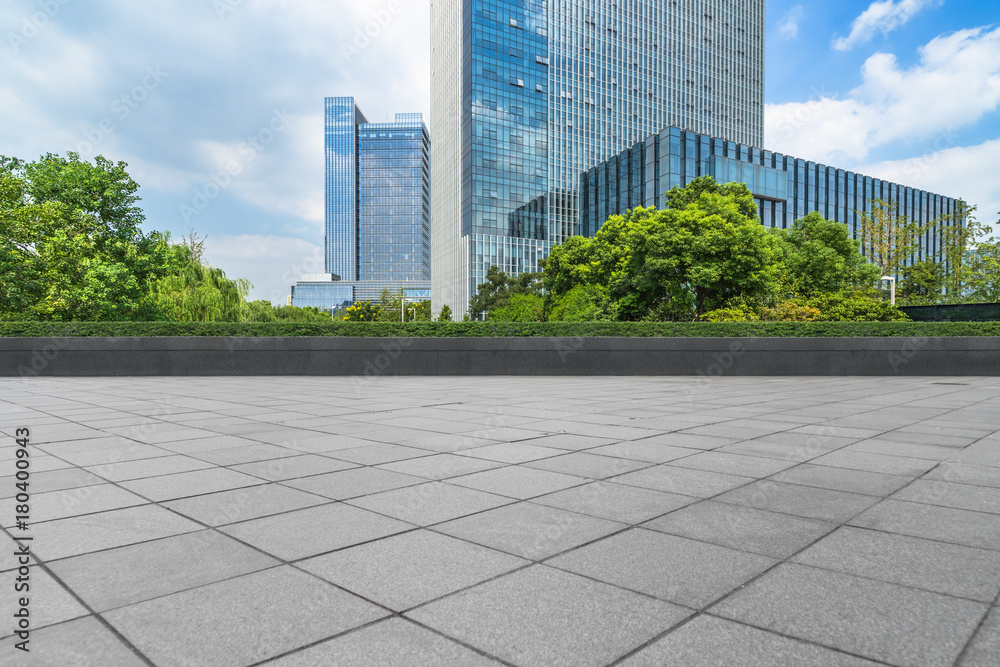 modern glass building exterior with empty pavement modern glass building exterior with empty pavement