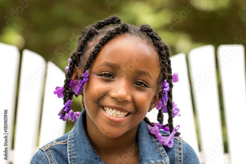 Foto Cute African American little girl.