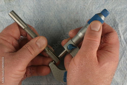 Imperial Vernier Micrometer, measuring chucking reamer, blue shop towel background
