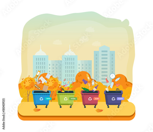 Containers for garbage of different types, on autumn street city.