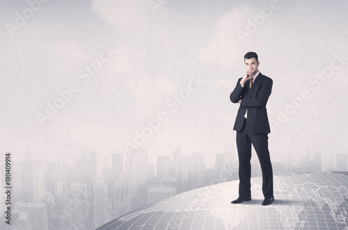 man standing in front of city landscape