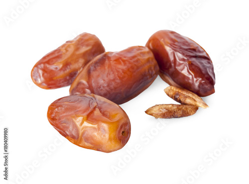dried fruits from date palm isolated on white background