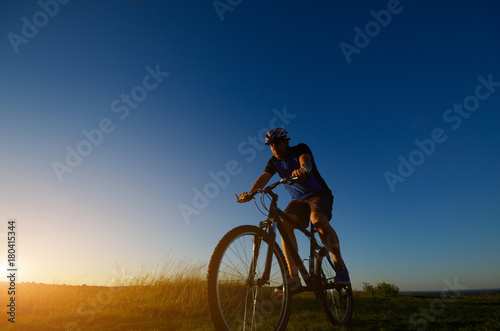 Male cyclist driving outdoors