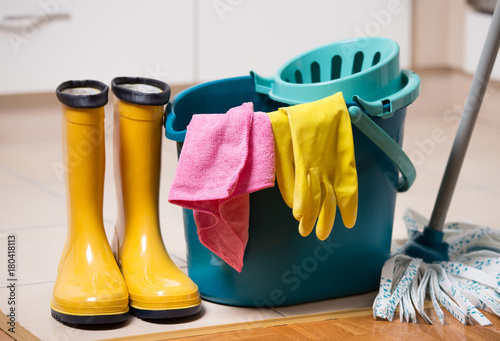 Cleaning equipment on kitchen floor