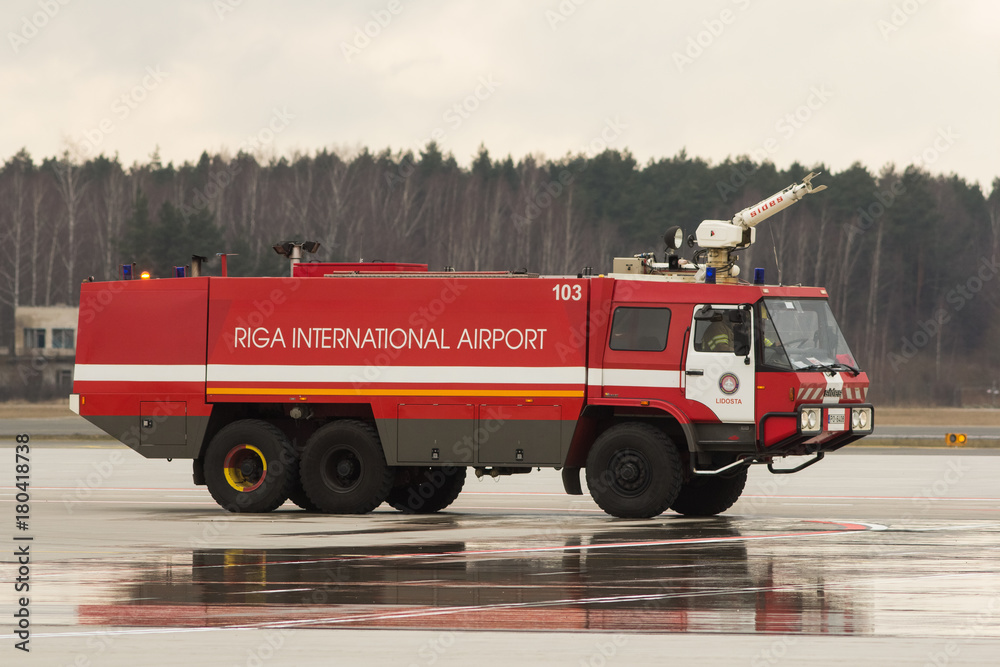 RIGA, LATVIA - NOVEMBER 11 2017: Modern fire truck at the airport Fire Department in Riga International Airport 