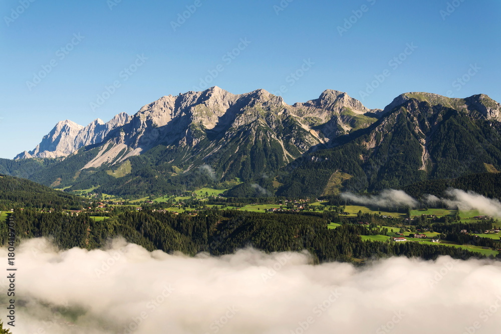 Fog in valley over Schladming, Dachstein Mountains, Alps, Austria