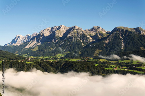 Fog in valley over Schladming, Dachstein Mountains, Alps, Austria