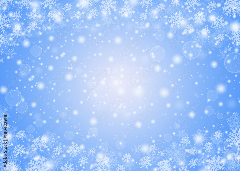Christmas winter abstract background with snowflakes, bokeh lights and place for text. Christmas New Year's wallpaper