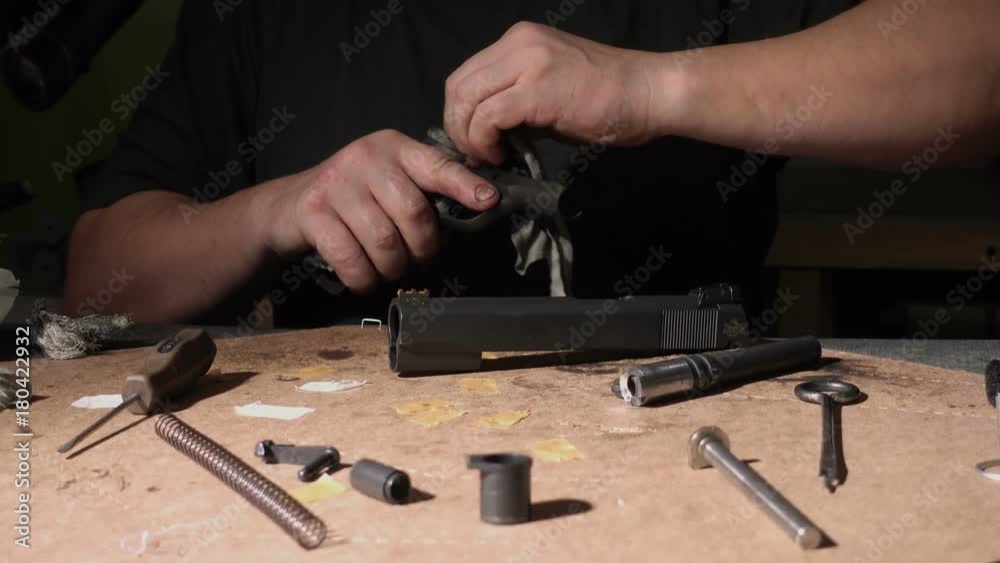 Firearm dis-assembly for cleaning and safety check of handheld gun.
Firearm dis-assembly for cleaning and safety check of handheld gun.